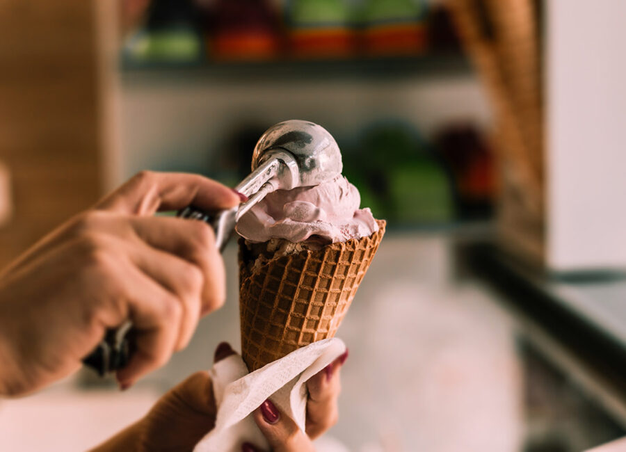 Woman scooping ice cream